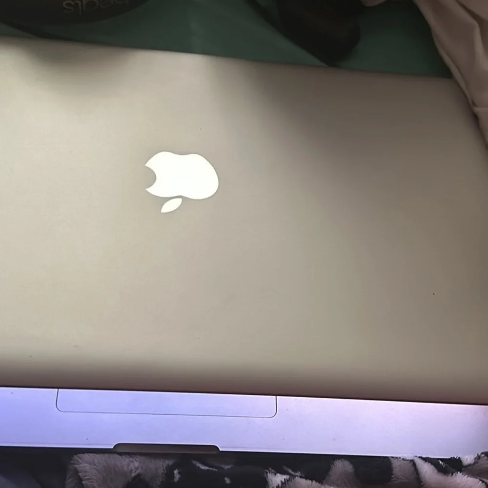 This is a MacBook Pro that comes with a charger and it’s 15 inches NC ONLY